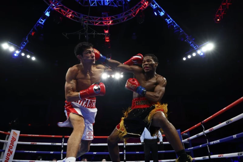 Raymond Ford's Thrilling Victory Over Otabek Kholmatov Secures WBA Featherweight Title in 12th Round
