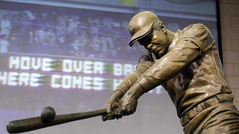 "Honoring Hank Aaron: Hall of Fame Statue and USPS Stamp Unveiled"